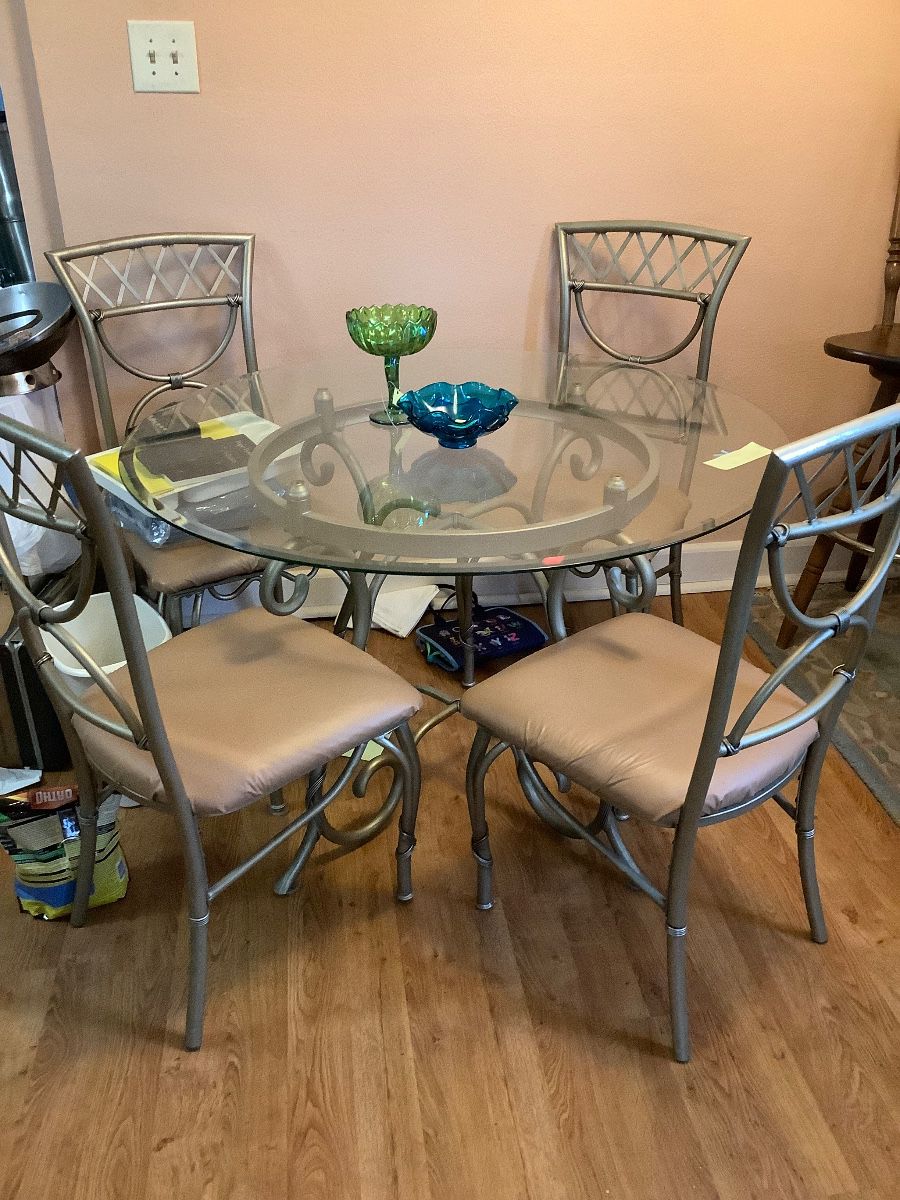 Heavy glass and chairs