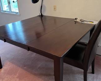 Work or dining table leaf folds inside