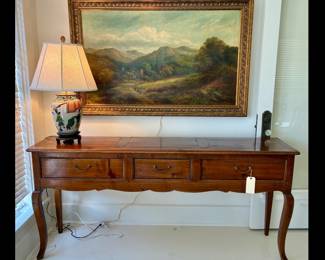 Three drawer country French console.  74.5”w x 34”h x 17”d 