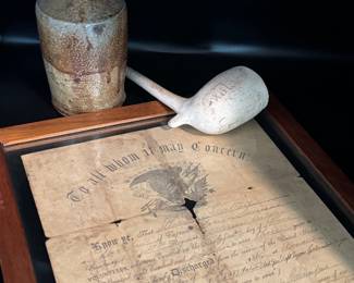 19thc. clay pipe with inscription, a salt glazed bottle with original stopper, and a US Army discharge dated 1866