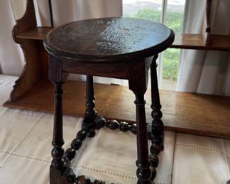 Small antique tavern or joint table, in background an antique two tiered wall shelf 60” long, both English.