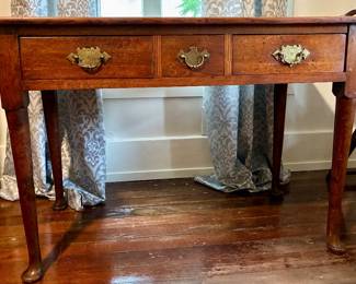 Georgian style lowboy, 19th century, solid oak, pad feet, original hand engraved brass pulls. 28h by 43 wide by 23 deep