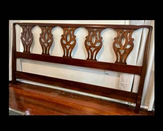 American bench made Henkel-Harris mahogany king headboard with pierced lyre splats, carved top rail, square posts.
