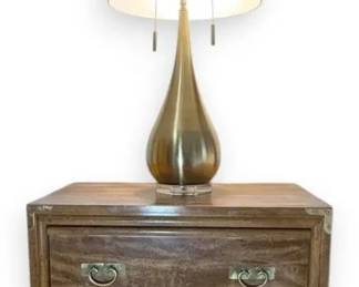 Wooden Nightstand With Metal Handles and Lamp