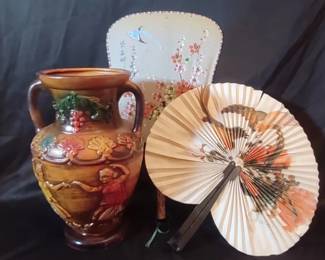 Asian-themed items including a vase and two fans