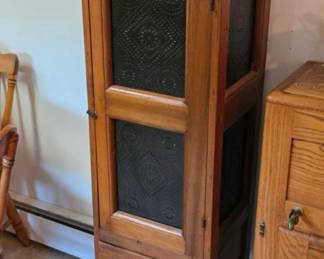 Pie safe cabinet with punched tin door and side panels