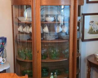 Oak bow front cabinet