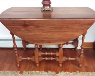 Double gateleg drop leaf table