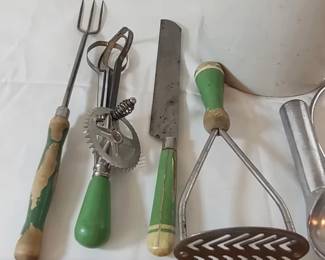 Vintage green-handled cooking utensils