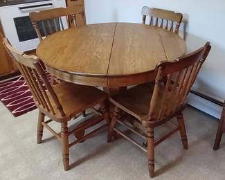 Antique oak table and maple chairs