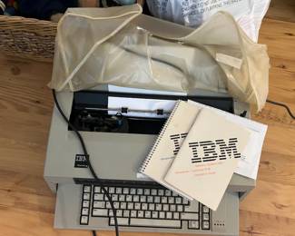 Vintage IBM Electric Typewriter with original manual.
