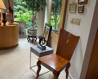 Art chair of metal and wood