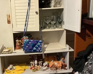 Shelving, cabinet, glasses, books, x-mas lights & more