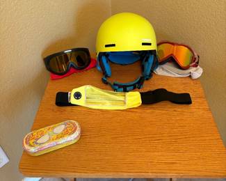 Ski googles, helmet, Brighton sunglasses