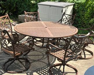 Ornate cast aluminum dining set 60" round table w/6 arm chairs.  