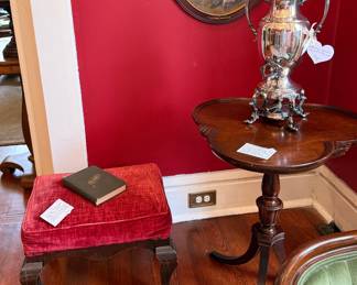 Antique upholstered Queen Anne footstool (original stuffing); vintage clover top mahogany pedestal table; vintage silver plated coffee urn.