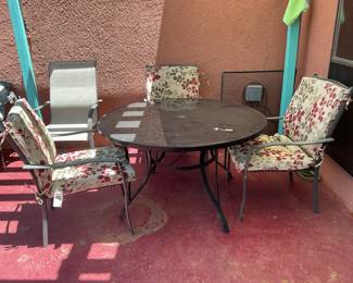 Round patio table- 50x28 3 chairs-25x38