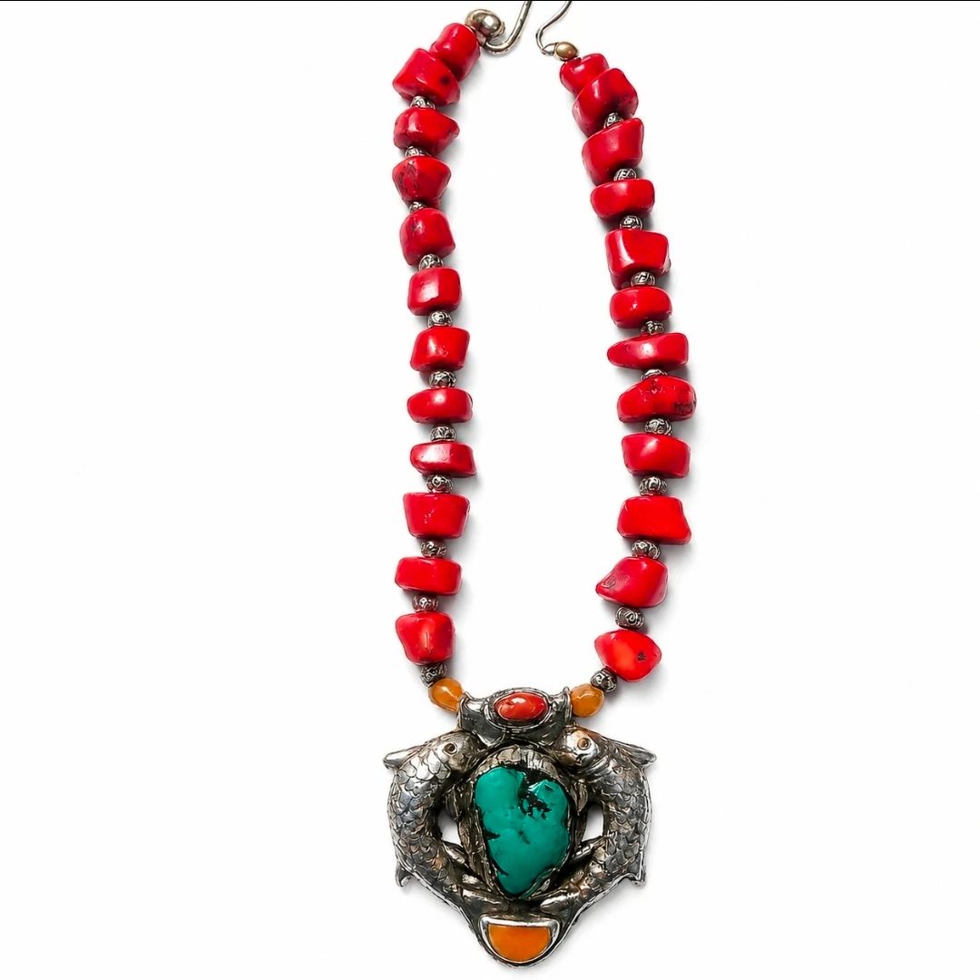 Dual-fish pendant w/ turquois center & red coral bead