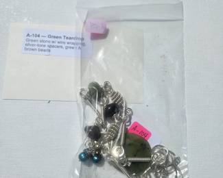 Green stone w/ wire wrapping, silver-tone spacers, green & brown beads