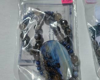 Boulder Opal Boulder opal, smoky quartz, blue lace agate, lapis lazuli, sliver