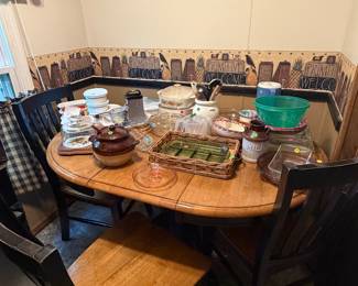 Beautiful kitchen table with four matching chairs and kitchen items