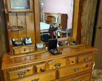 Beautiful wooden dresser with mirror that goes with bedroom set