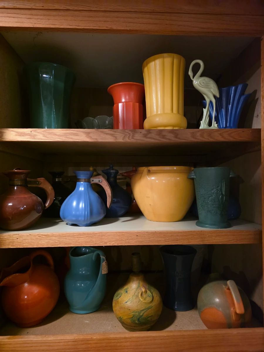 vintage North Carolina tourist art pottery jug with a decorative multi-colored "rainbow" drip glaze, often produced by families like the Coles