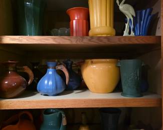 vintage North Carolina tourist art pottery jug with a decorative multi-colored "rainbow" drip glaze, often produced by families like the Coles