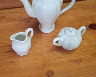 White Ceramic Teapot, Creamer, and Sugar Bowl Set