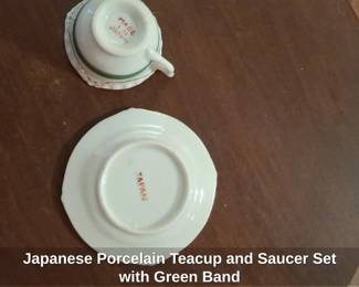 Japanese Porcelain Teacup and Saucer Set with Green Band second image