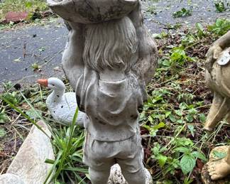 Vintage Concrete Garden Statue of a Child Carrying a Large Leaf Bowl