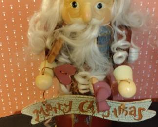 Wooden Nutcracker with Merry Christmas Banner