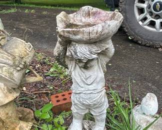 Vintage Concrete Garden Statue of a Child Carrying a Large Leaf Bowl second image