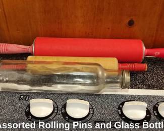 Assorted Rolling Pins and Glass Bottle