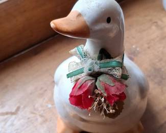 Ceramic Duck Figurine with Floral Embellishment