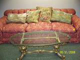 Nice Printed Sofa and a Brass Glass-top coffee table