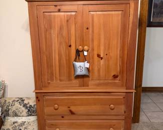 Armoire matching the bedroom suit