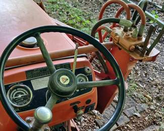 A look at the tractor's steering wheel, instruments, and loader controls
