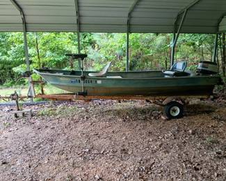 15 ft. Duracraft fishing boat with Evinrude 25hp outboard and 28 lb thrust Motor Guide trolling motor