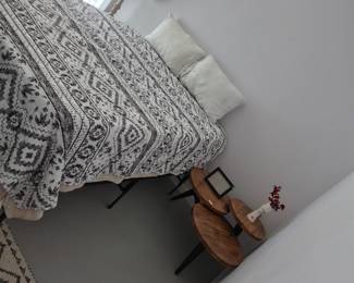 Queen bed set:	Mattress, mattress pad, mattress cover, 2 pillows, bed frame, sheets, comforter •	$100