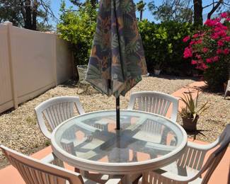 Grey Table Set with 4 chairs •	48” across •	$60