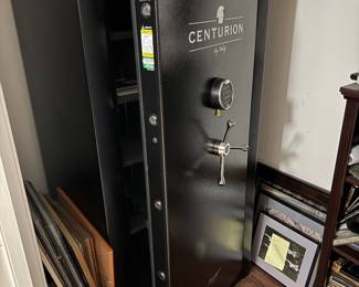 #50 - $700 - CENTURION by Liberty Safe This Used Liberty Colonial D-23 Gun Safe measures 60"x30"x22", weighs around 530 lb. and has a 45 min Fire Rating. This safe comes equipped with a Mechanical Dial Lock and can fit up to 25 Long Guns - 2014 