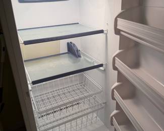 #67 - $ - Kenmore up-right Freezer