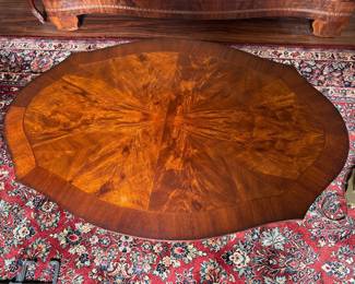 Old World style coffee table flamed mahogany veneer  46x30x20 1/2