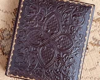 Civil War era daguerreotype portrait of young girl with embossed case (detail)...