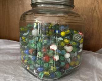 006 largejarofassortedvintageglassmarb