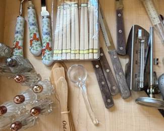 Vintage Kitchen Utensils with Decorative Handles and Wooden Spoons