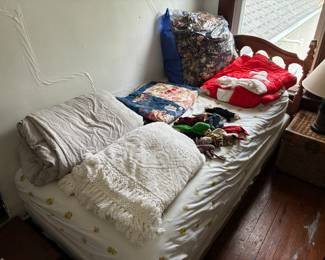 Twin bed and blankets