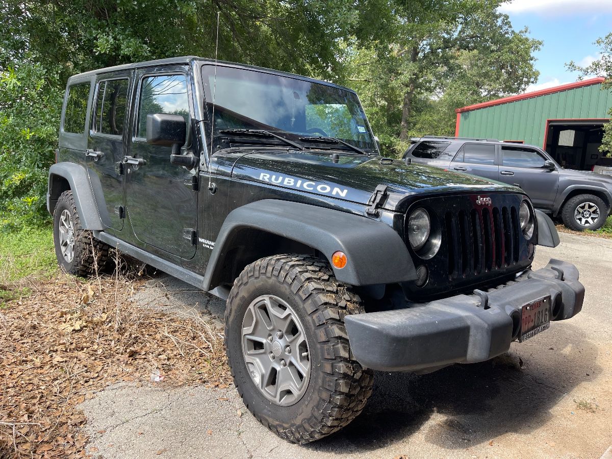 GARAGE KEPT 2014 JEEP WRANGLER RUBICON WITH 108, 329 MILES AND A CLEAN TITLE