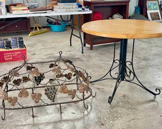 WROUGHT IRON GRAPE MOTIF HANGING POT RACK, ROUND WOOD TOP BISTRO TABLE WITH METAL BASE